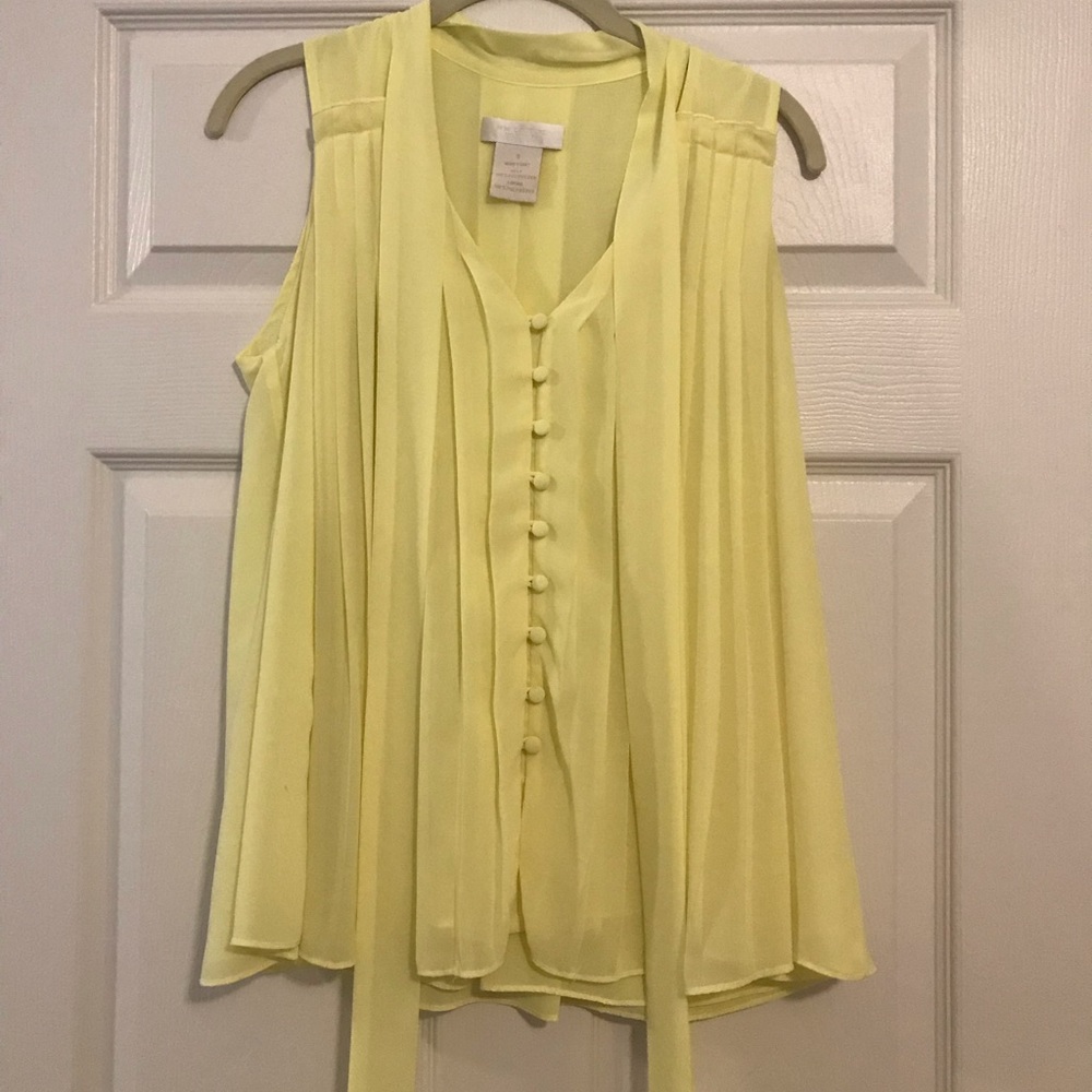yellow sleeveless button down with tie
